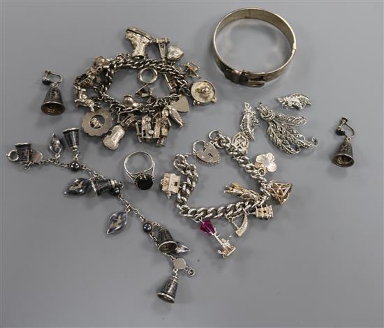 Two silver charm bracelets, a silver bangle, a silver and niello bracelet and earrings, marcasite earrings etc.